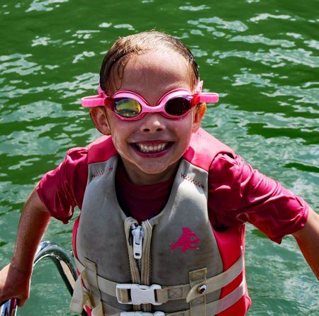 Child having fun boating